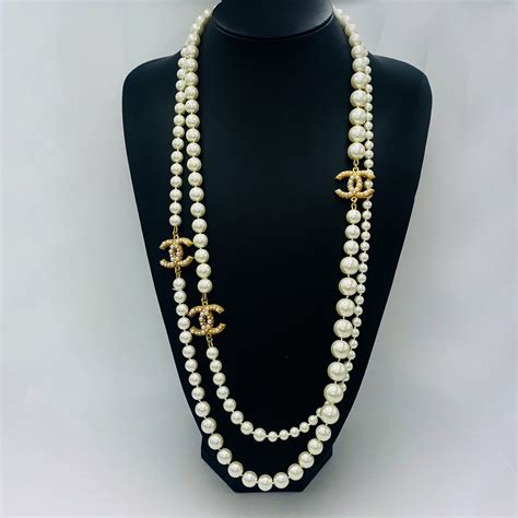 chanel cc pearl necklace|Chanel pearl long strand necklaces.